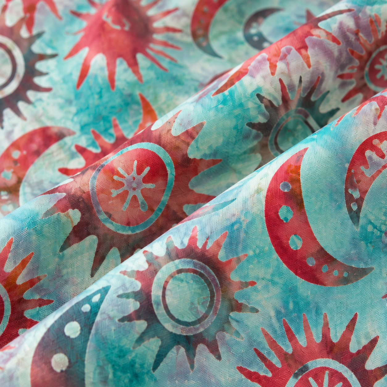 Tela batik algodón 100% soles y lunas fondo verde agua — imagen 1